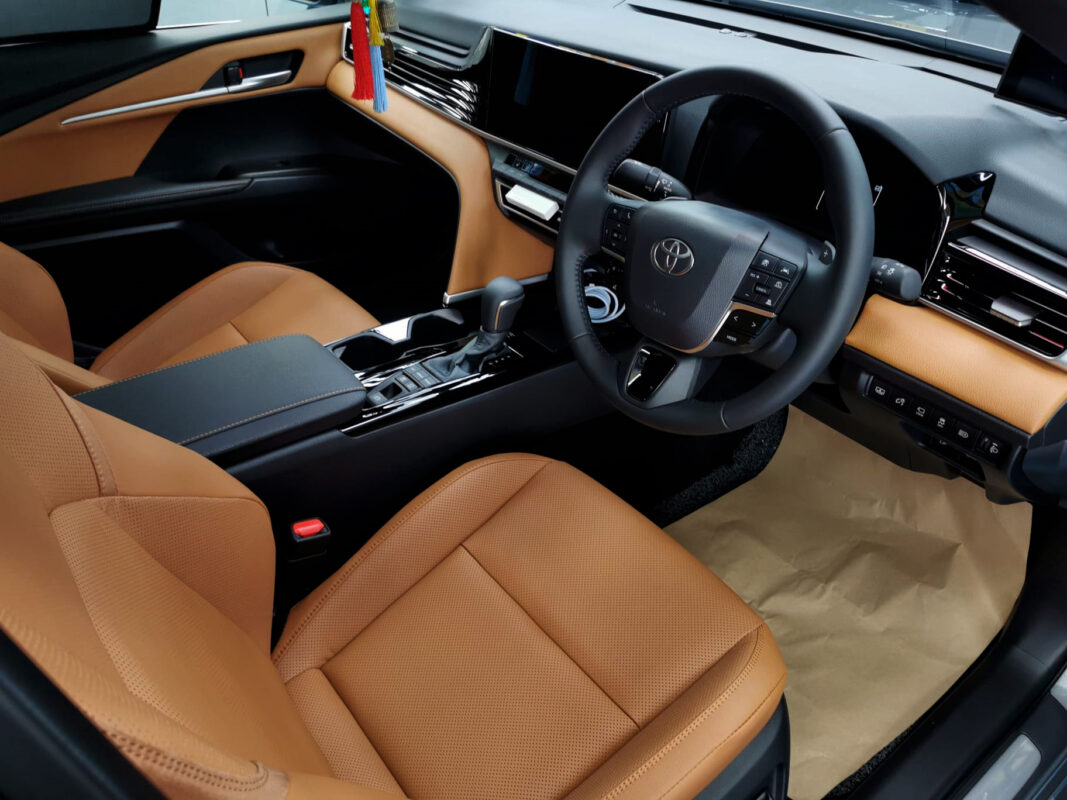 The Toyota Camry parked in the workshop, freshly coated.
