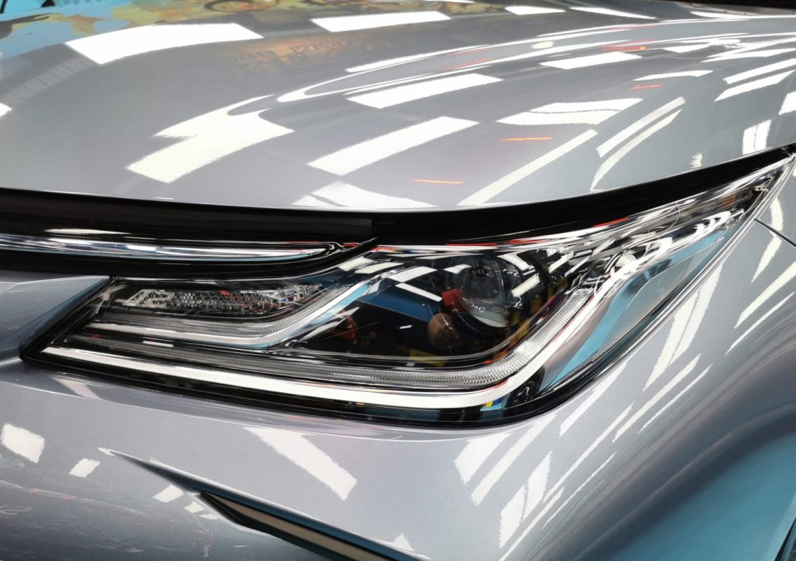 The Altis's coated paintwork showing clean reflections.