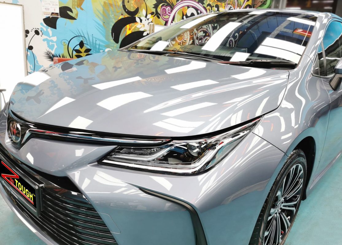 The Toyota Corolla Altis Elegance from a side angle after the titanium coating.