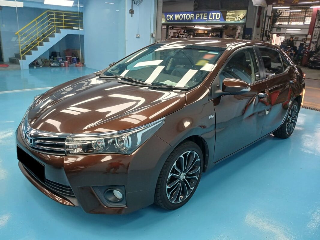 The Toyota Corolla Altis as it arrived at Revol Carz, before the respray.