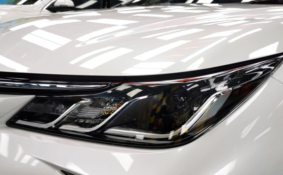 The Altis's coated paintwork showing clean reflections.