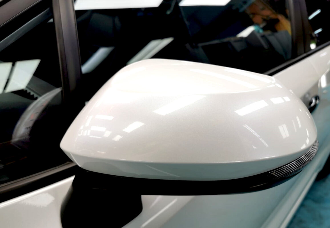 The Toyota Corolla Altis parked in the workshop, freshly coated.