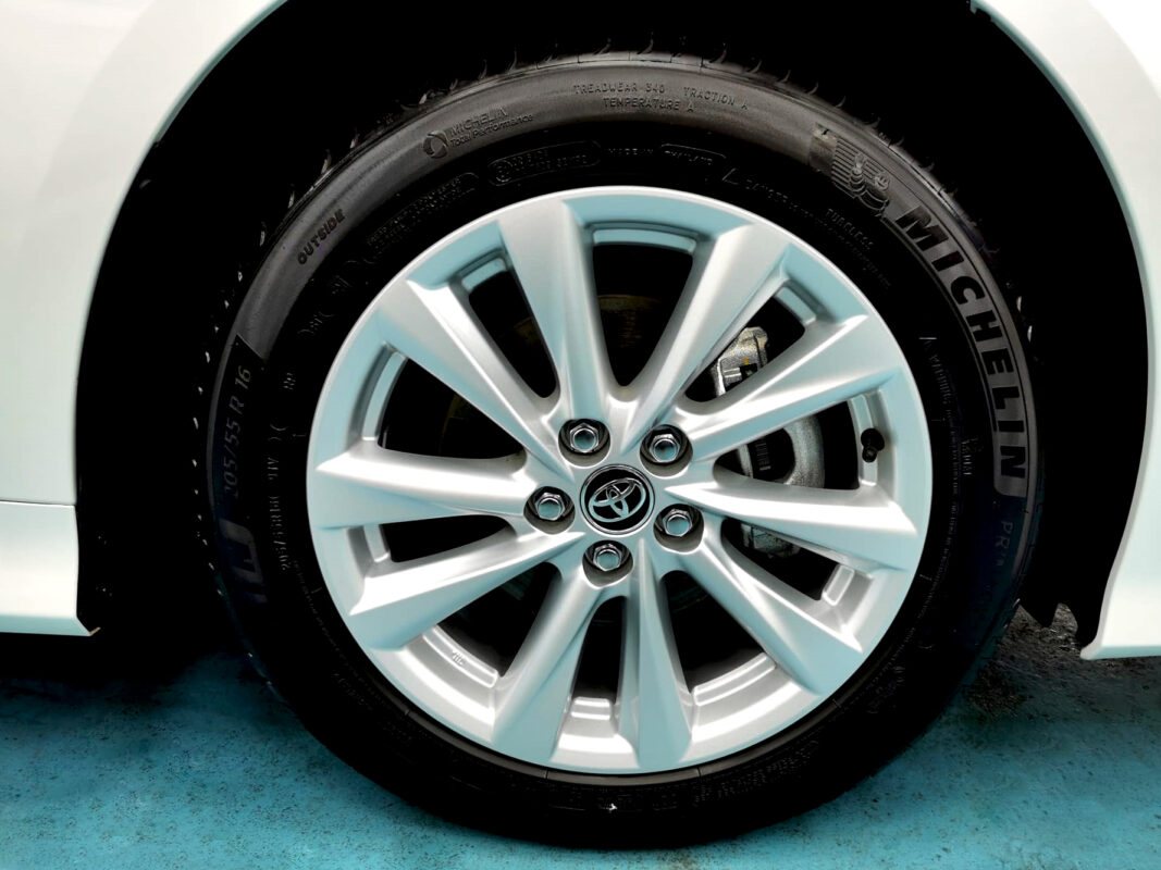 Rear quarter of the Toyota Corolla Altis, glossy and protected.