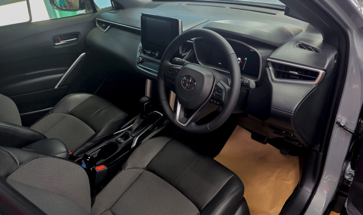 The Toyota Corolla Cross Hybrid parked in the workshop, freshly coated.