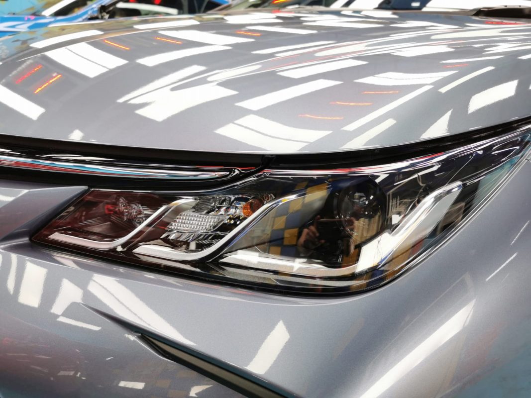 The Corolla's coated paintwork showing clean reflections.