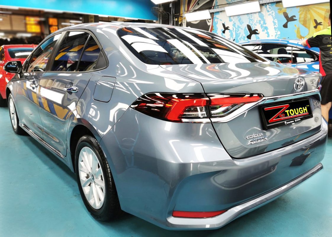 Rear quarter of the Toyota Corolla, glossy and protected.