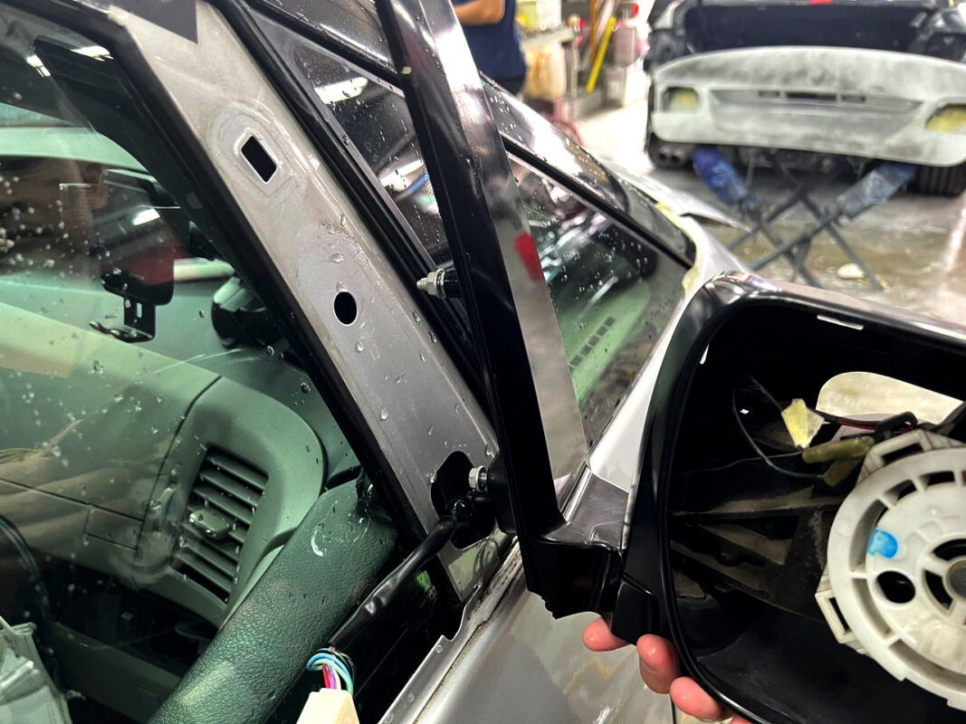 The Estima being stripped down, panels and trim removed to prepare for respray.