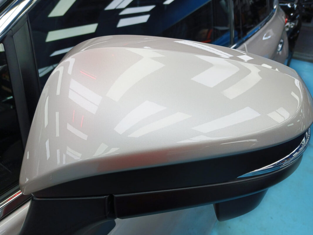 Side panel of the Toyota Harrier with the titanium finish locked in.