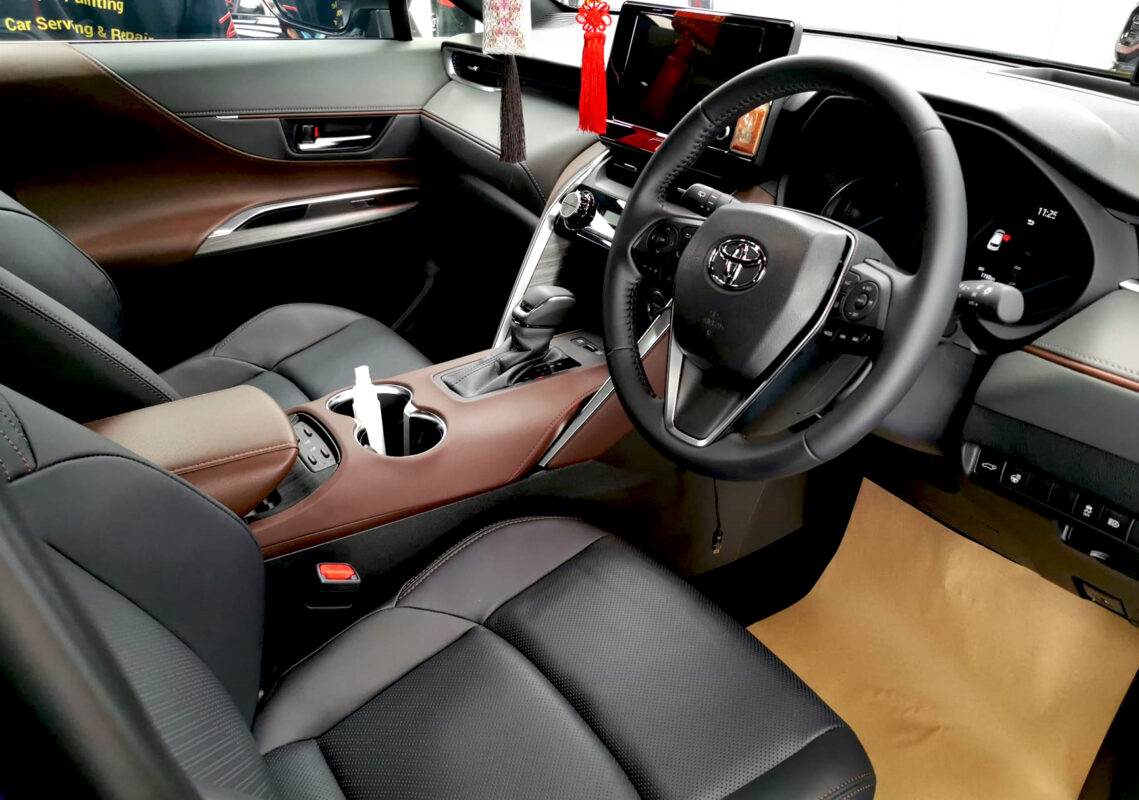 The Toyota Harrier parked in the workshop, freshly coated.