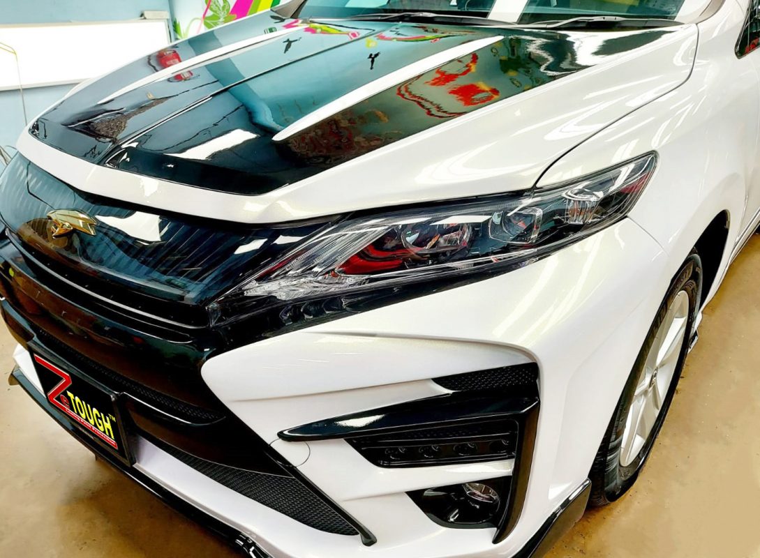 The Toyota Harrier Elegance from a side angle after the titanium coating.