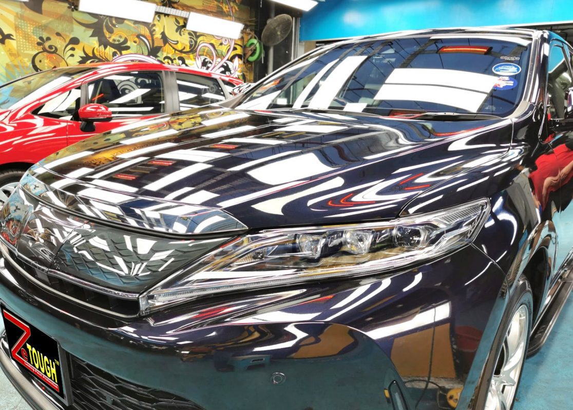 The Toyota Harrier from a side angle after the ceramic coating.