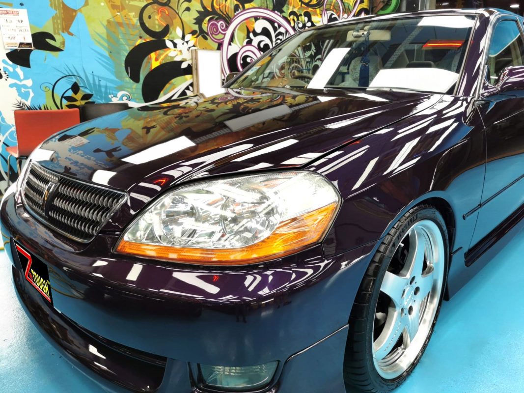 The Toyota Mark II from a side angle after the ceramic coating.
