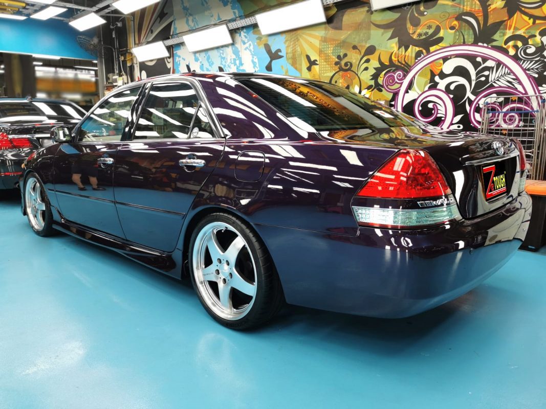 Rear quarter of the Toyota Mark II, glossy and protected.