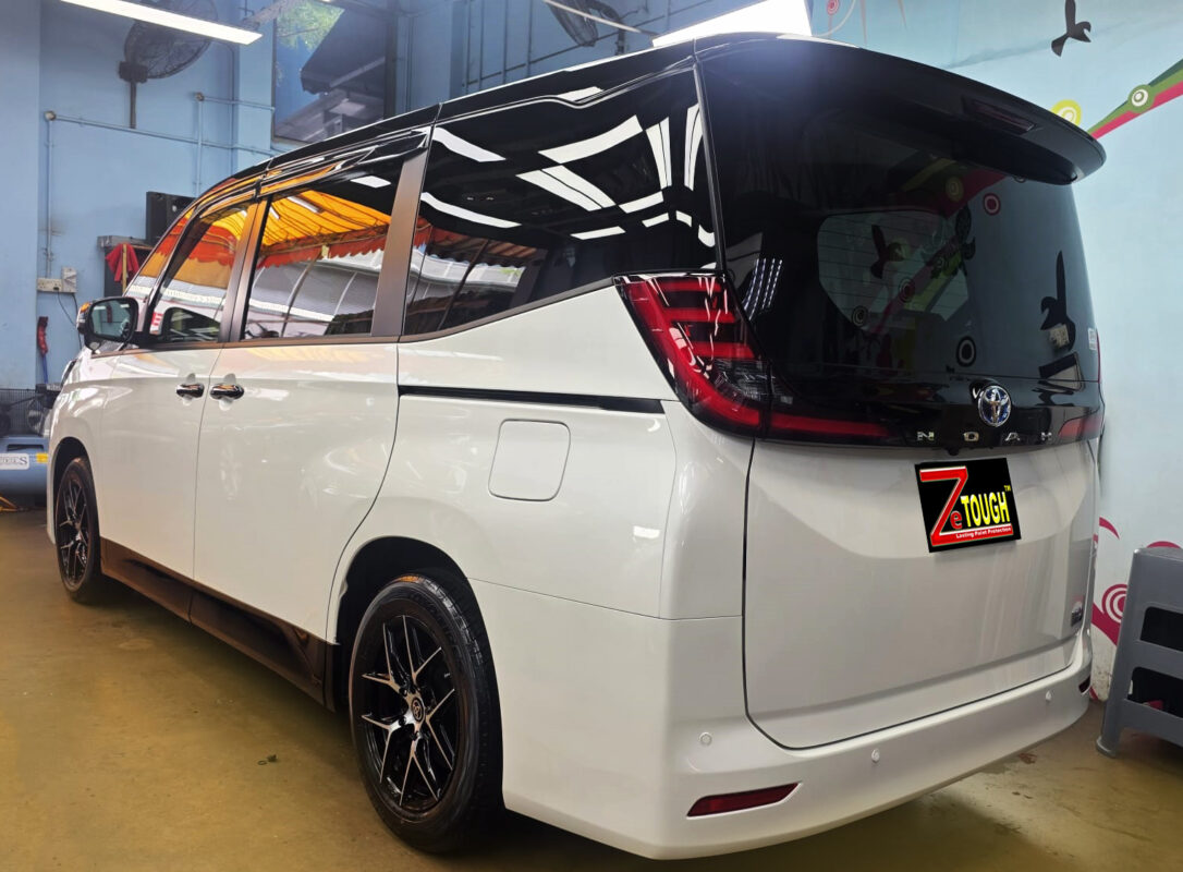 Rear quarter of the Toyota Noah, glossy and protected.
