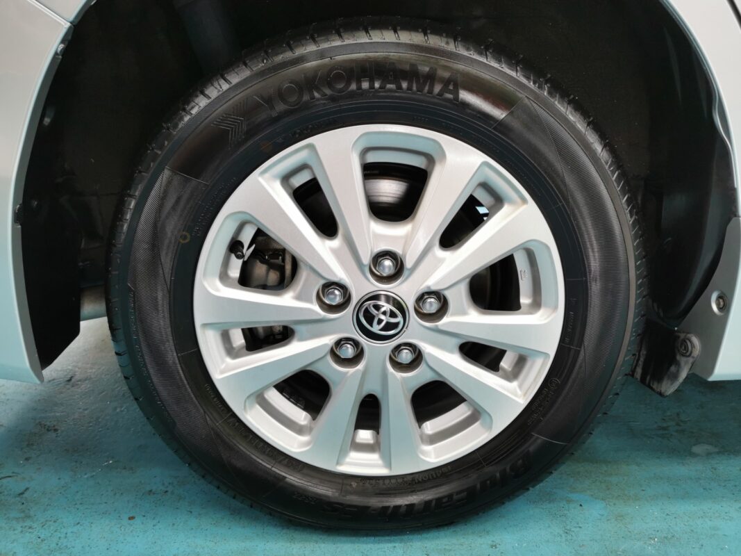 After: the same angle, Toyota Noah resprayed to a glossy showroom finish.