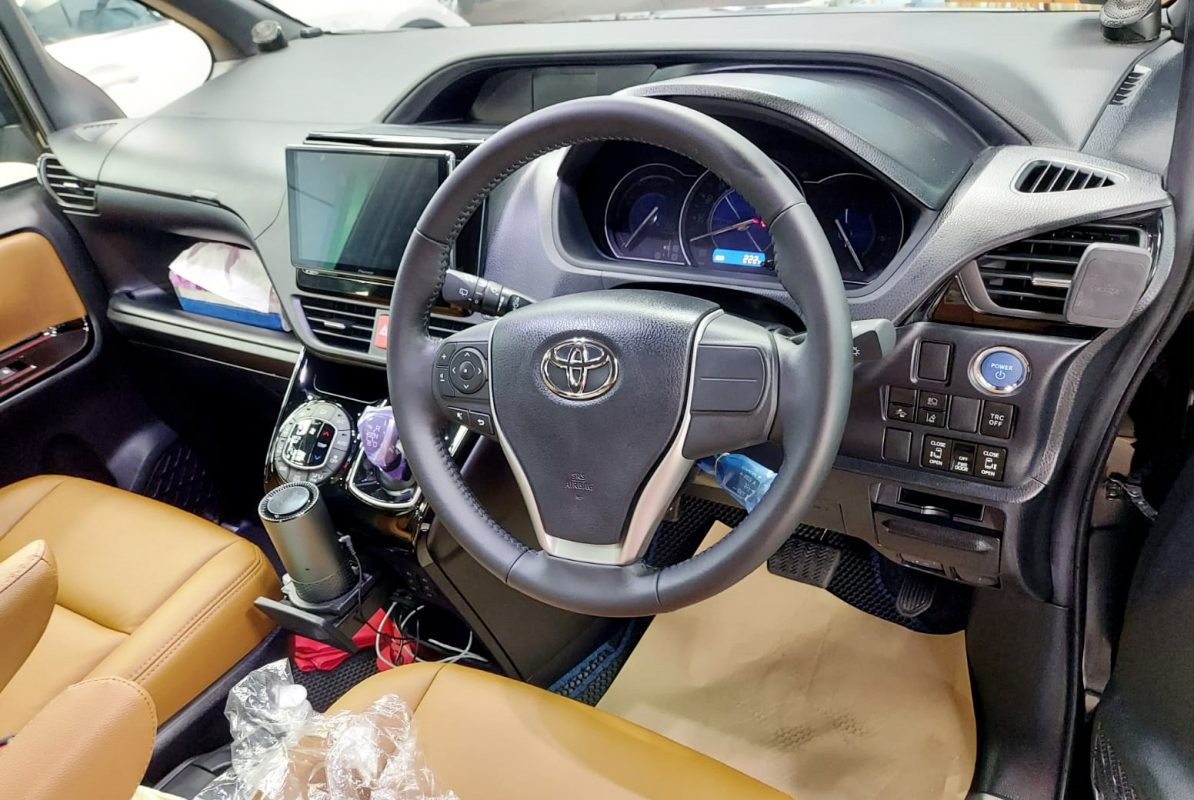 The Toyota Noah parked in the workshop, freshly coated.