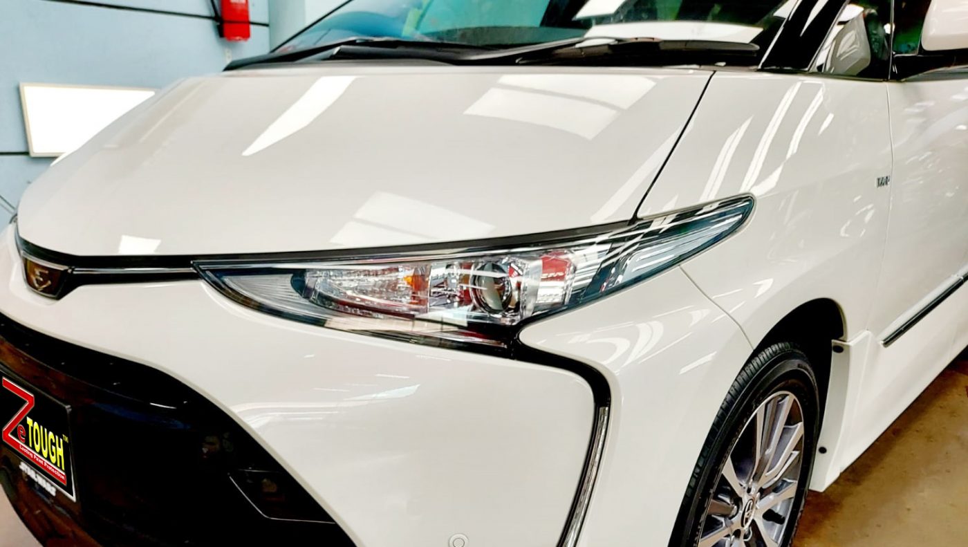 The Toyota Previa Aeras from a side angle after the titanium coating.