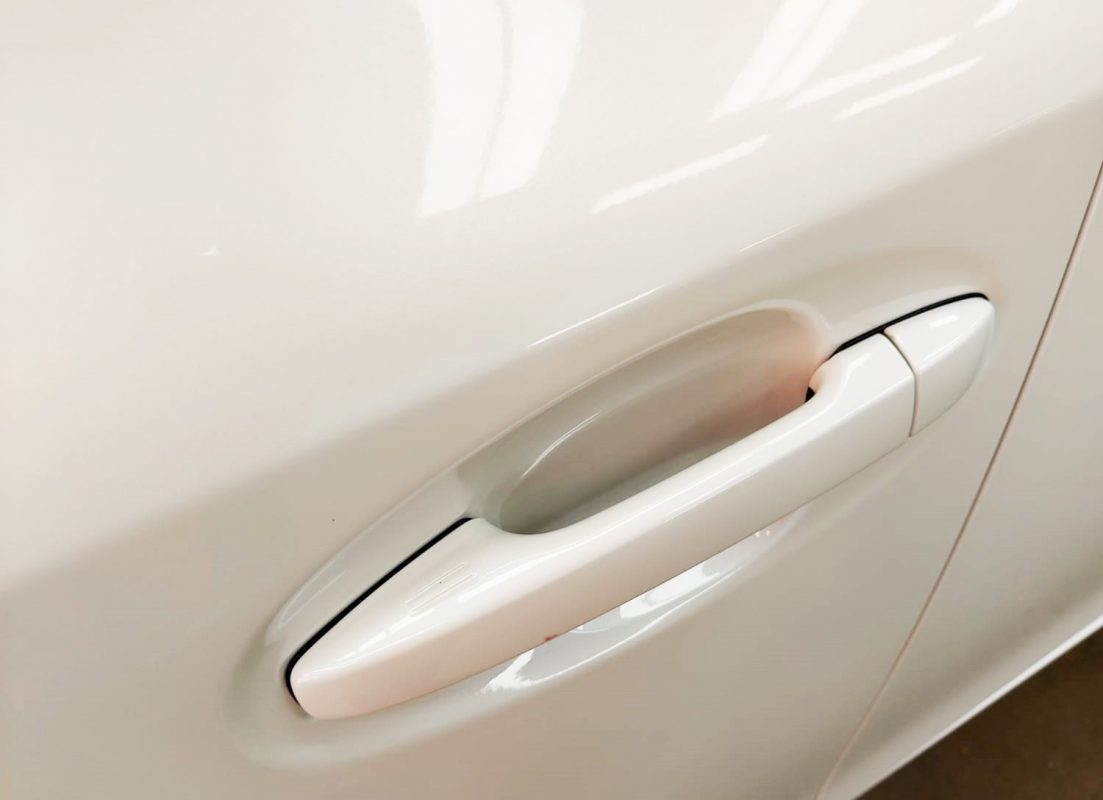Front three-quarter view of the Toyota Prius Plus after coating.