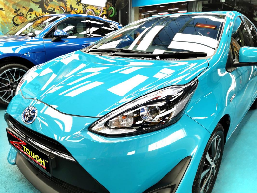 The Toyota Prius from a side angle after the titanium coating.