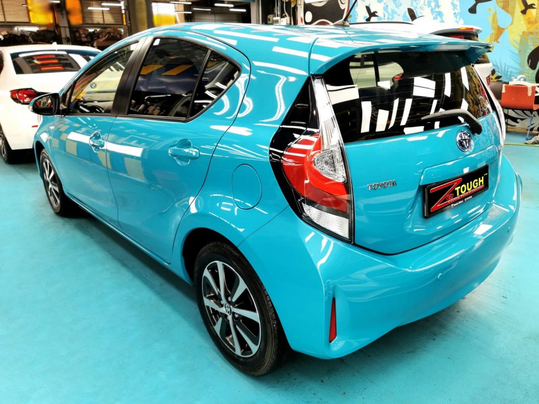 Rear quarter of the Toyota Prius, glossy and protected.