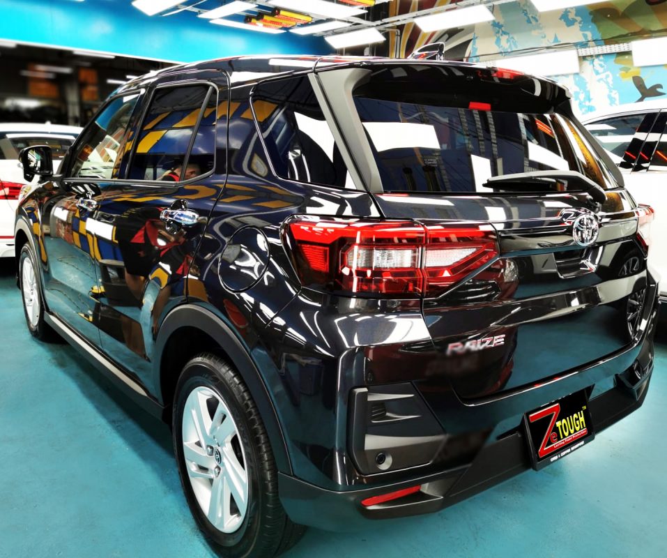 Rear quarter of the Toyota Raize, glossy and protected.