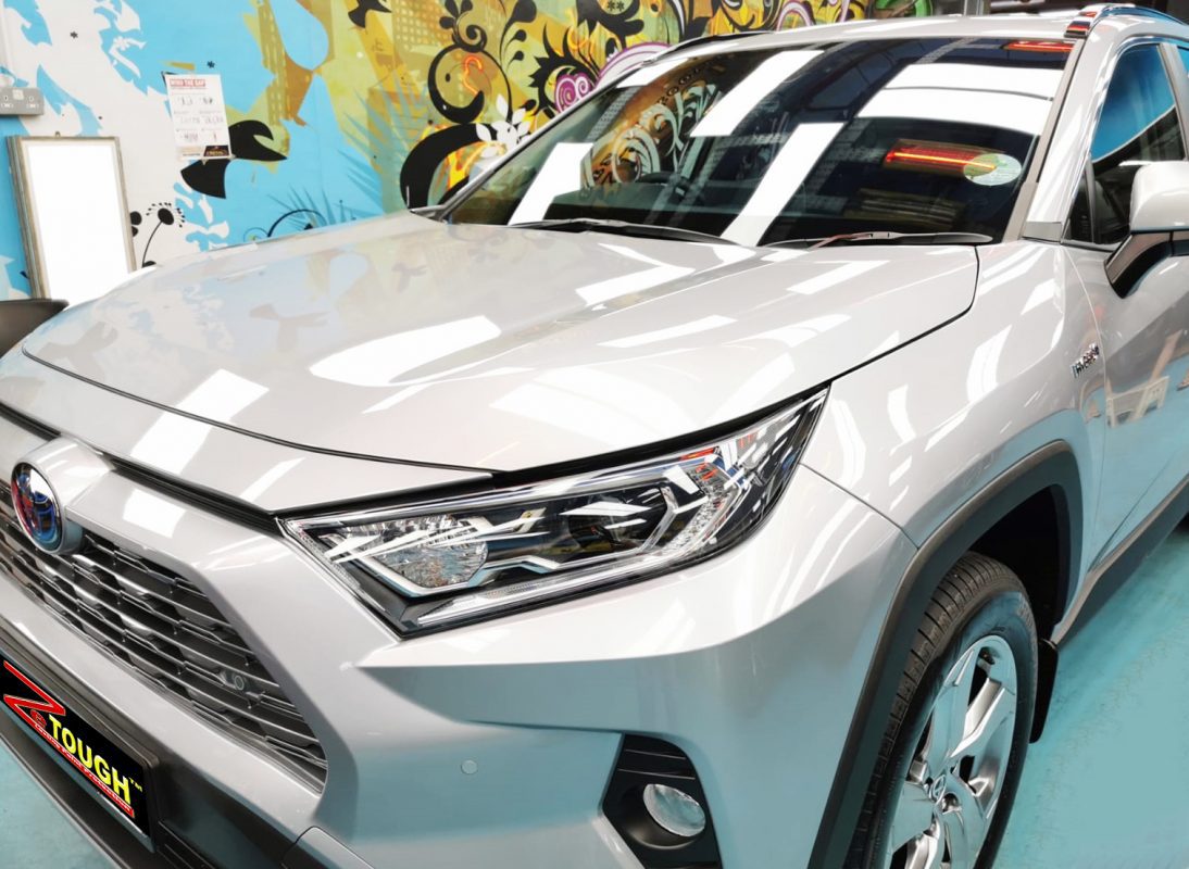 The Toyota RAV4 from a side angle after the ceramic coating.