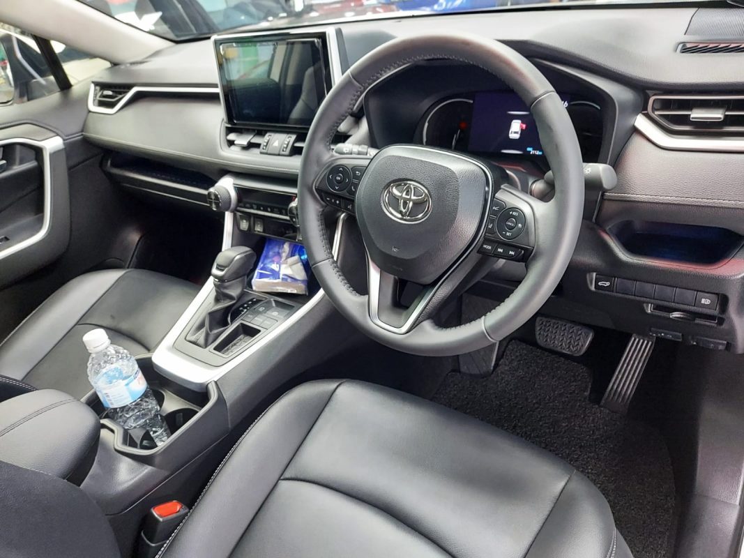 The Toyota RAV4 parked in the workshop, freshly coated.