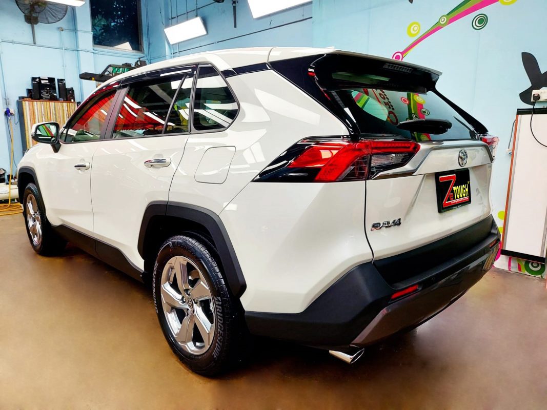 Rear quarter of the Toyota RAV4, glossy and protected.