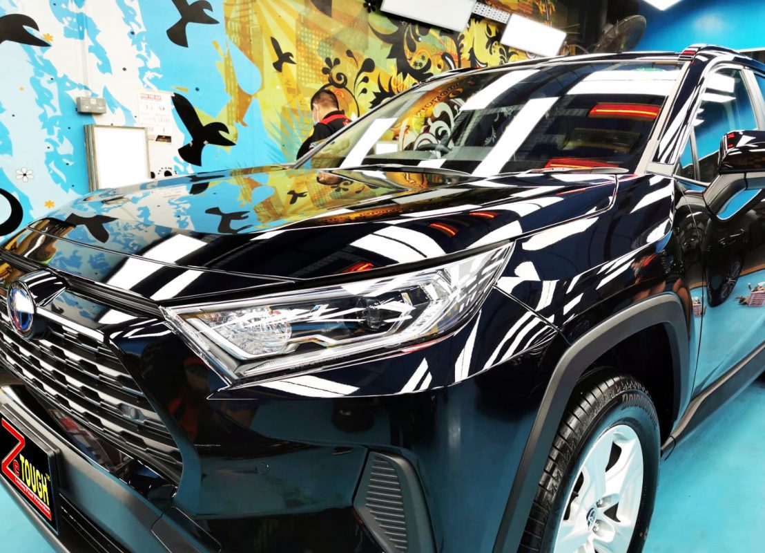 The Toyota RAV4 from a side angle after the ceramic coating.