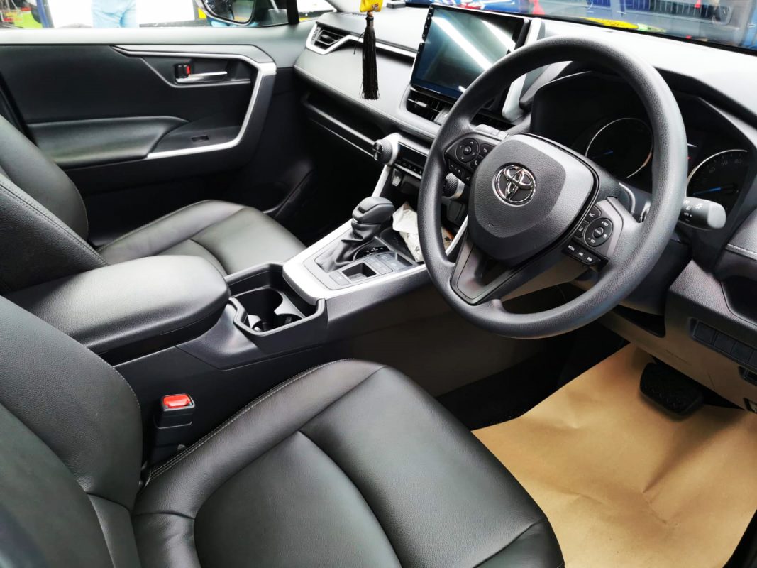The Toyota RAV4 parked in the workshop, freshly coated.