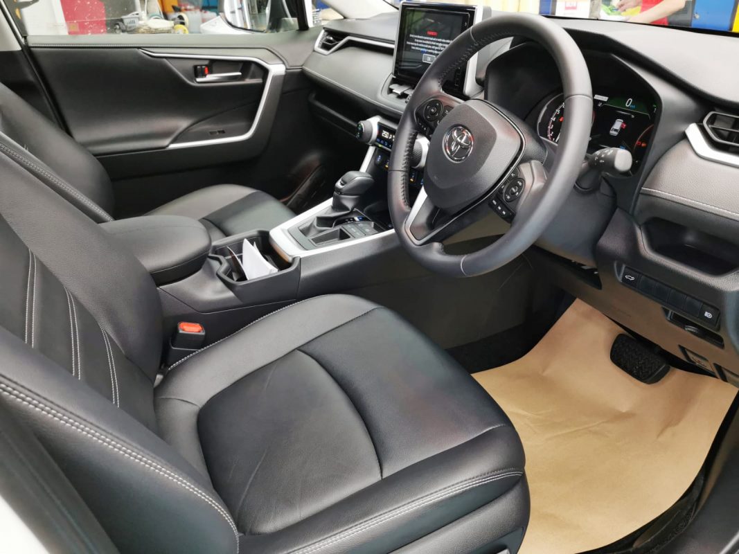 The Toyota RAV4 parked in the workshop, freshly coated.
