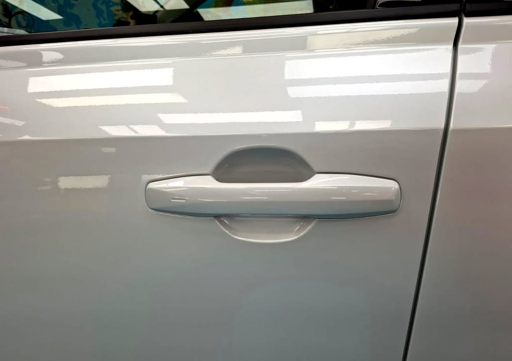 White door panel and handle.