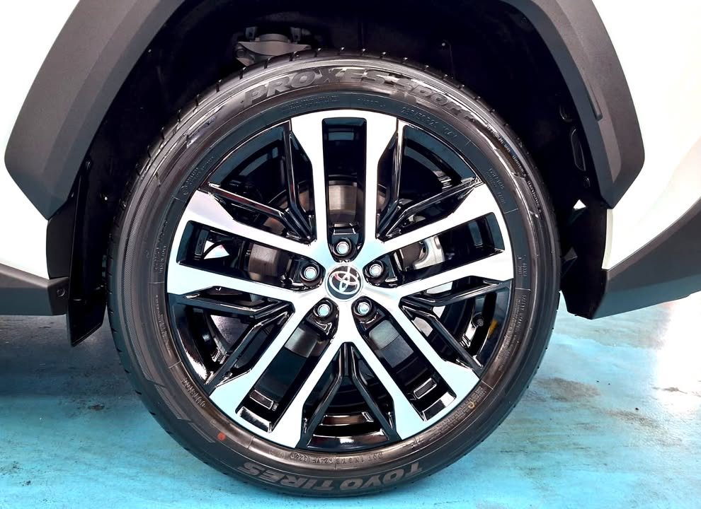 Close-up of the two-tone multi-spoke Toyota alloy wheel.