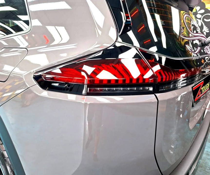 Close-up of the RAV4 tail lamp and grey rear quarter.