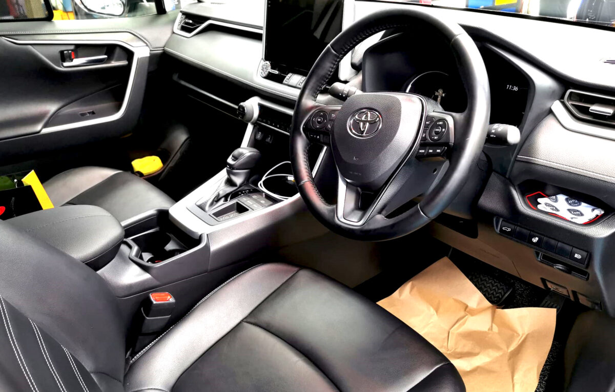 The Toyota RAV4 parked in the workshop, freshly coated.