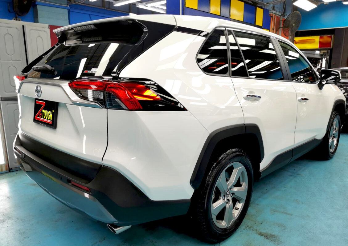 Rear quarter of the Toyota RAV4, glossy and protected.