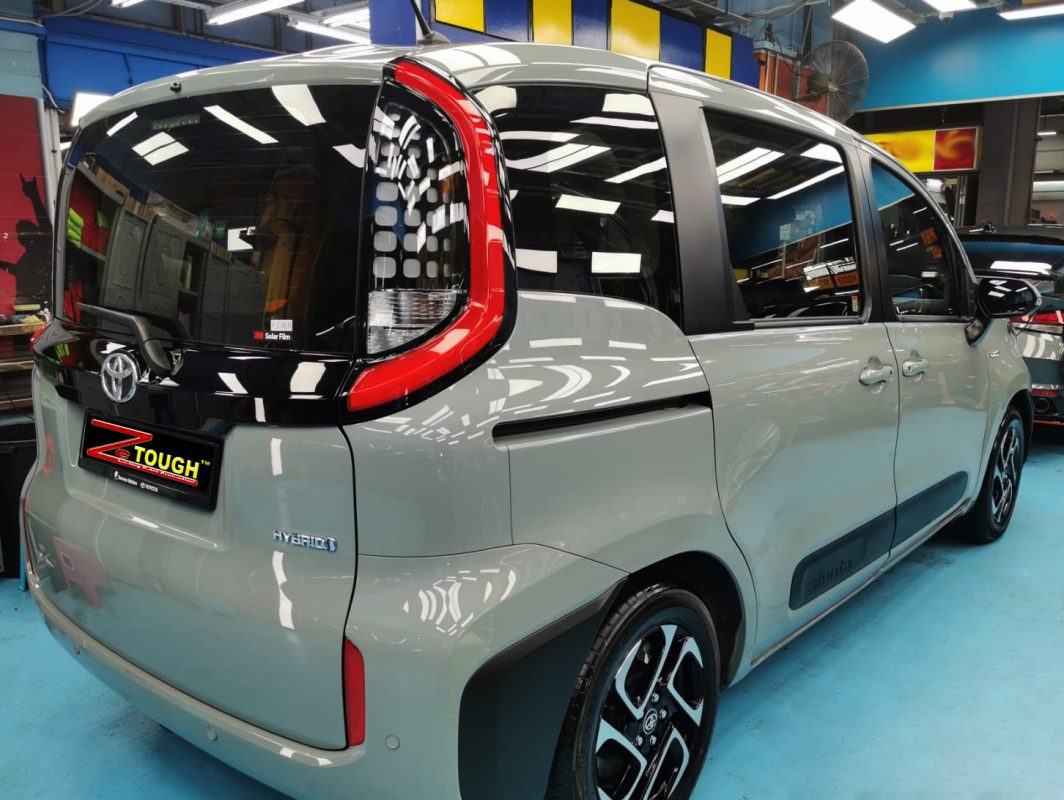 Rear quarter of the Toyota Sienta, glossy and protected.