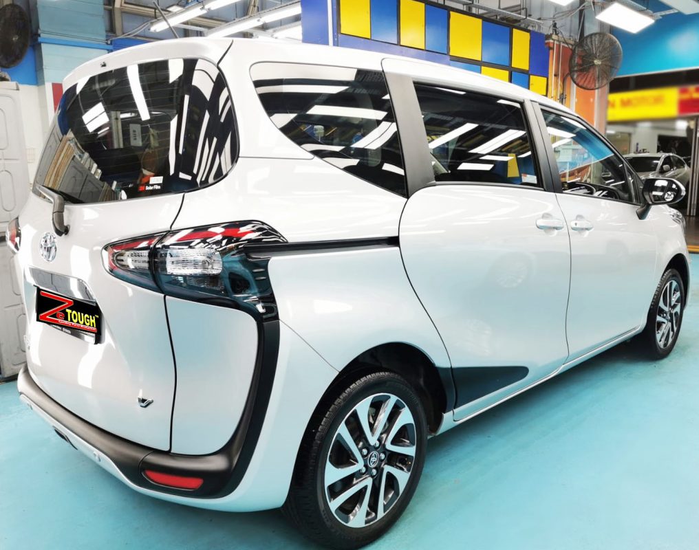 Rear quarter of the Toyota Sienta, glossy and protected.