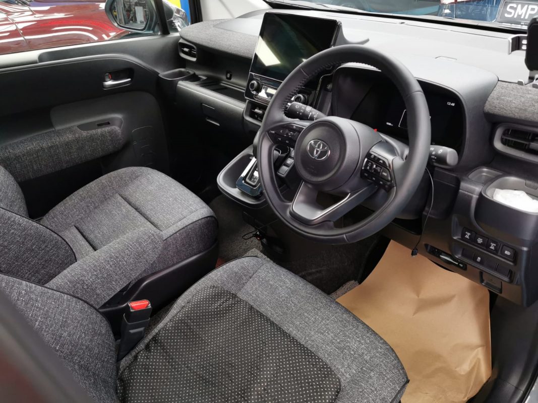 The Toyota Sienta Hybrid parked in the workshop, freshly coated.