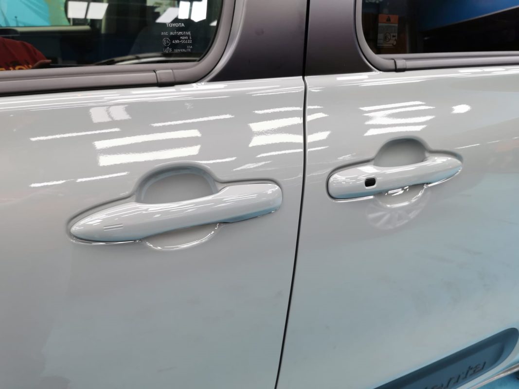 Front three-quarter view of the Toyota Sienta Hybrid after coating.
