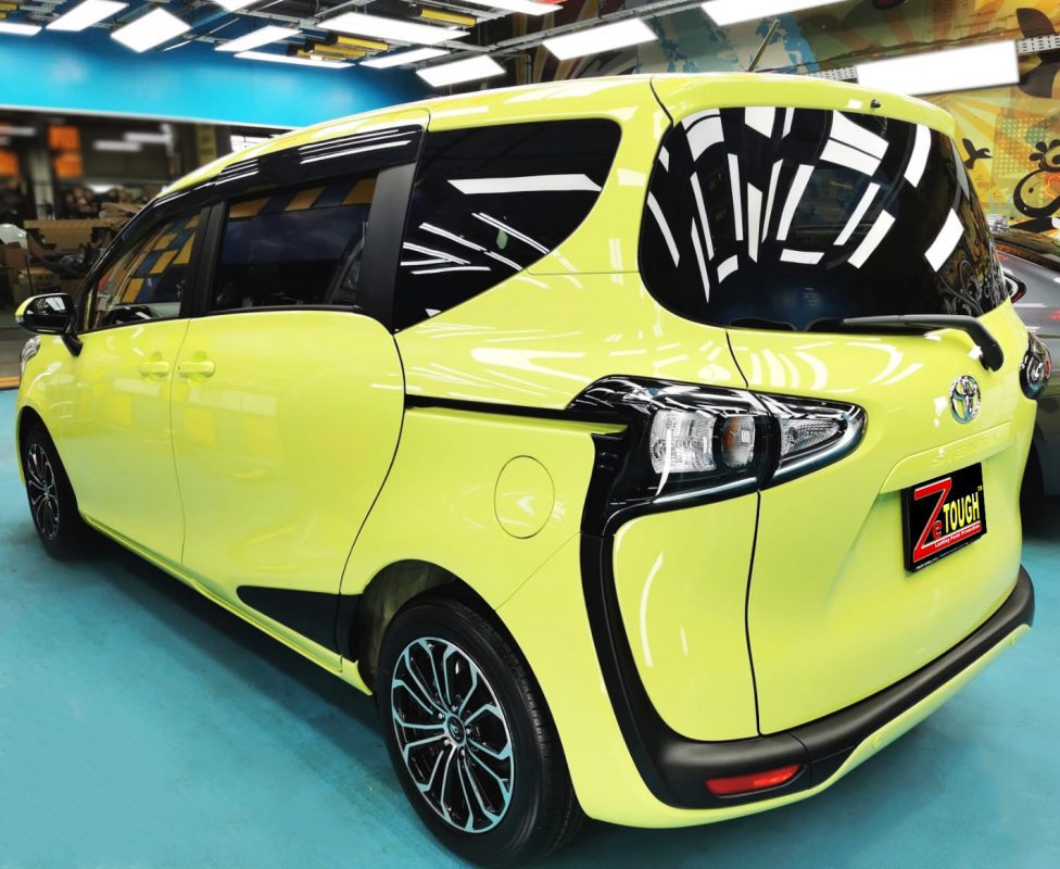 Rear quarter of the Toyota Sienta, glossy and protected.