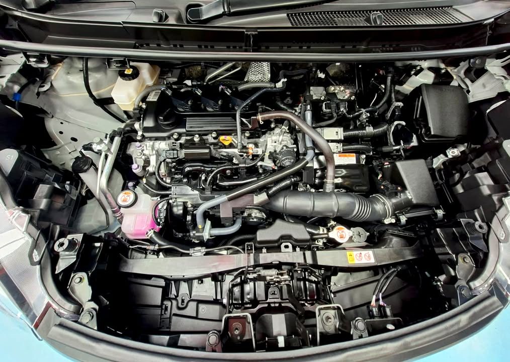 Engine bay of the Sienta with the bonnet open.