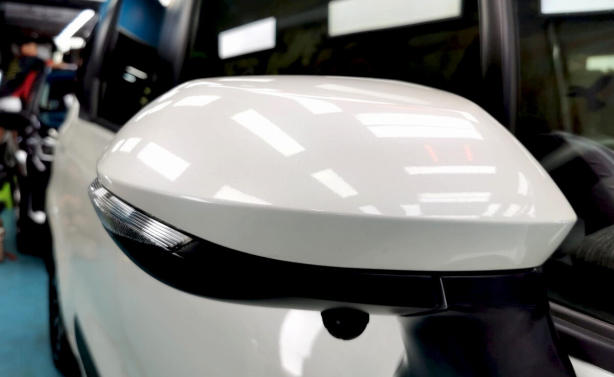 Side panel of the Toyota Sienta with the titanium finish locked in.