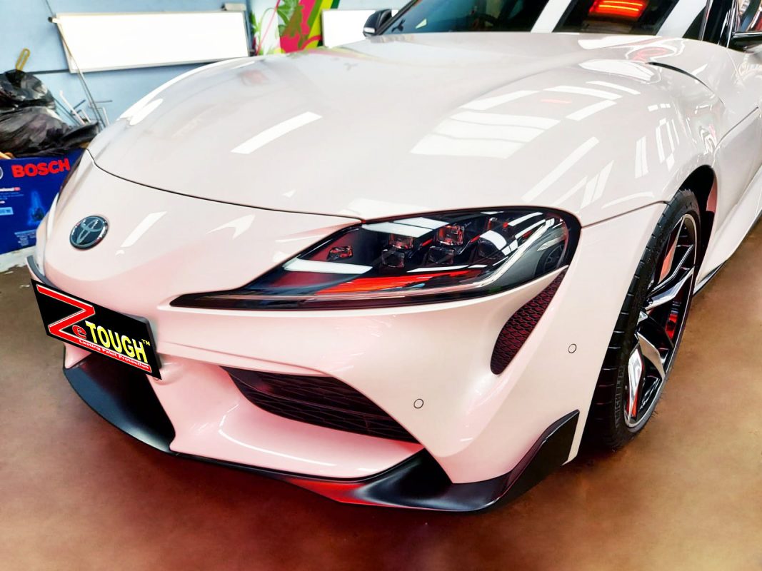 The Toyota Supra RZ from a side angle after the ceramic coating.