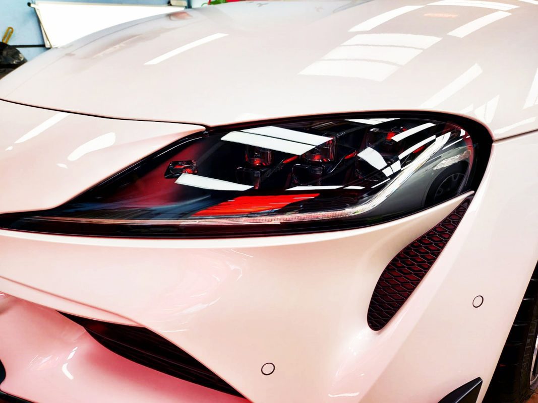 The Supra RZ's coated paintwork showing clean reflections.