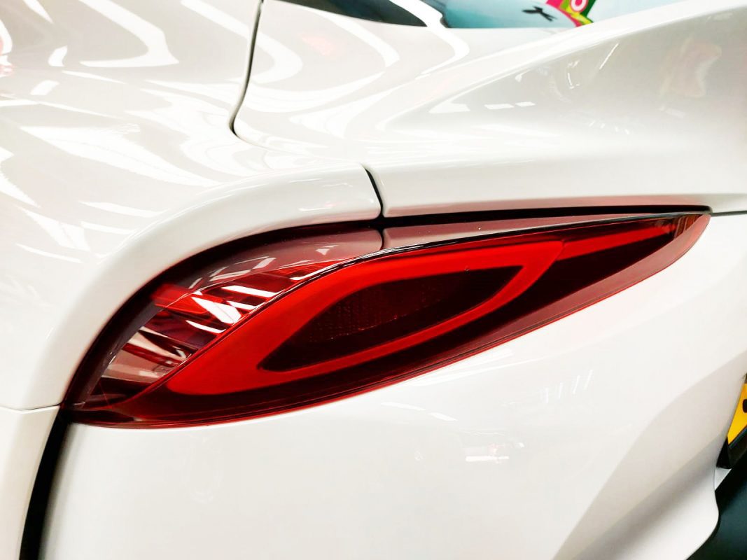 Rear quarter of the Toyota Supra RZ, glossy and protected.