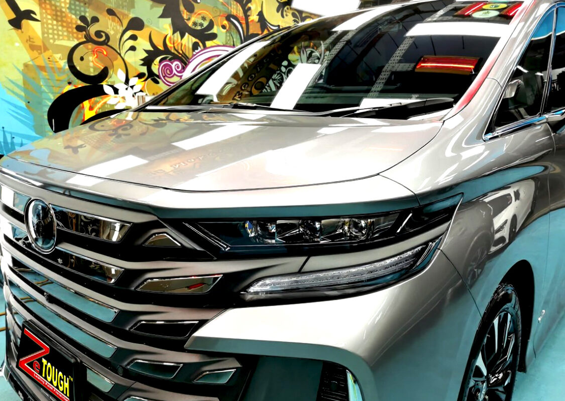 The Toyota Vellfire from a side angle after the ceramic coating.