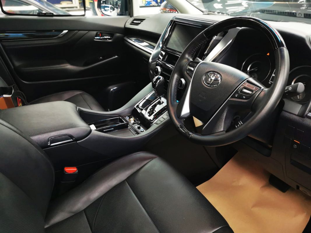 The Toyota Vellfire parked in the workshop, freshly coated.
