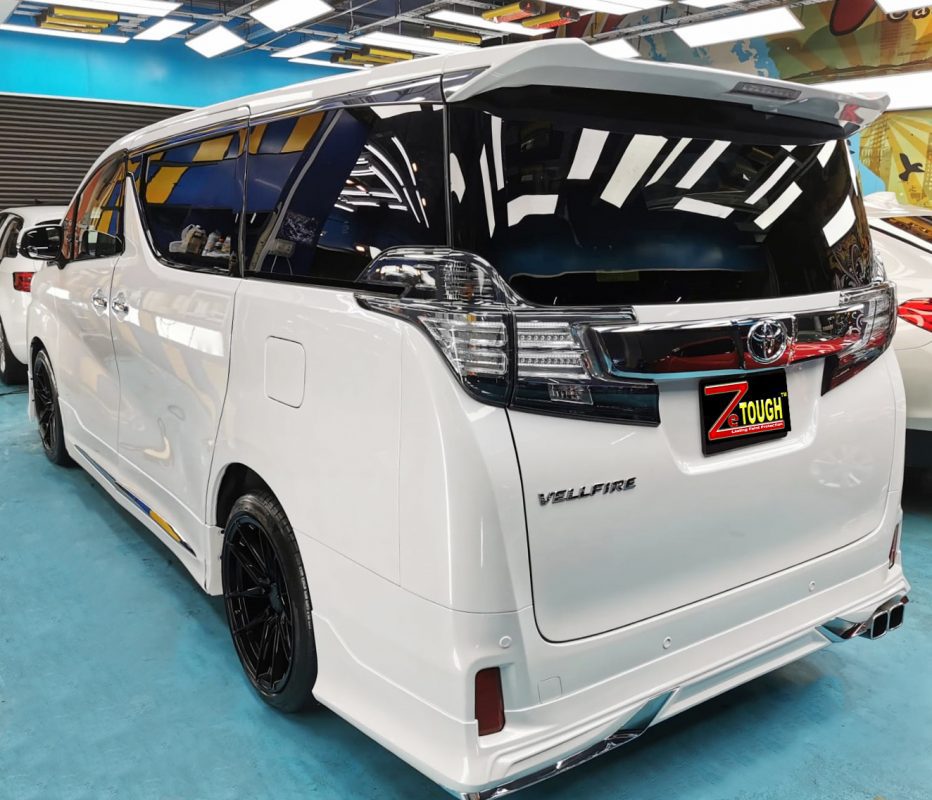Rear quarter of the Toyota Vellfire, glossy and protected.