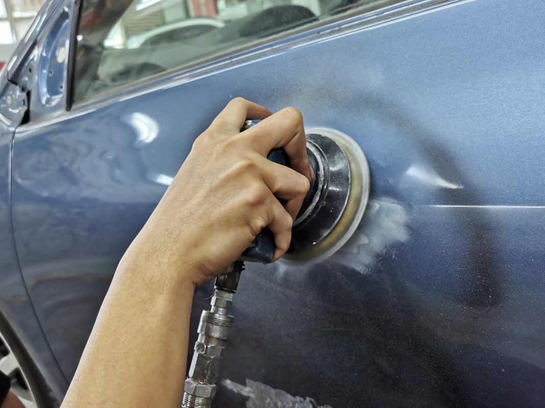 The body of the Toyota Vios being checked and patched for imperfections.